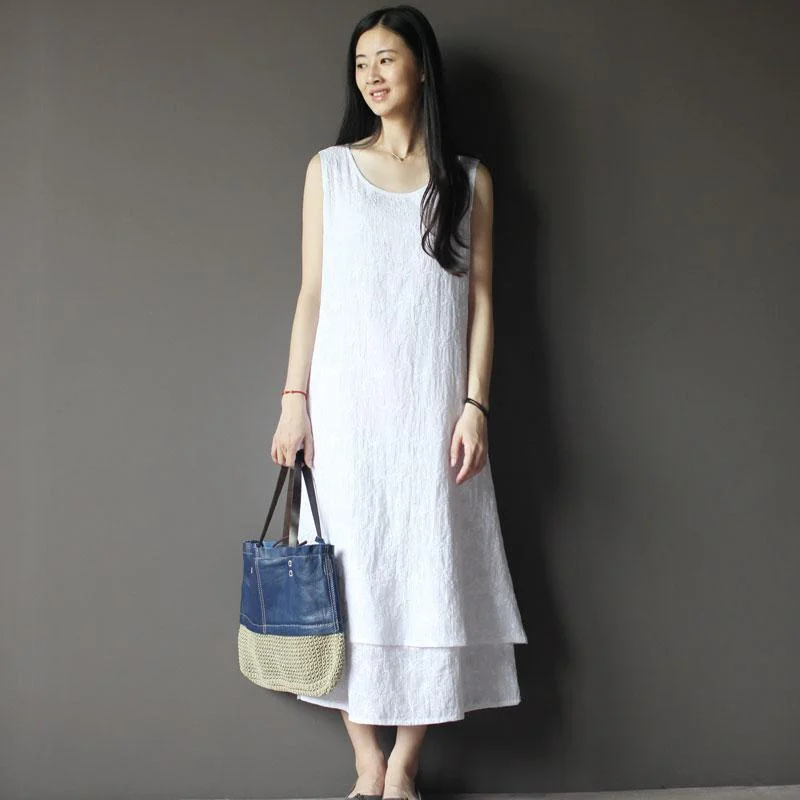 Elevate your look with premium women’s wear White pure cotton maxi dress layered casual sundress Elevate your look with premium women’s wear White pure cotton maxi dress layered casual sundress
